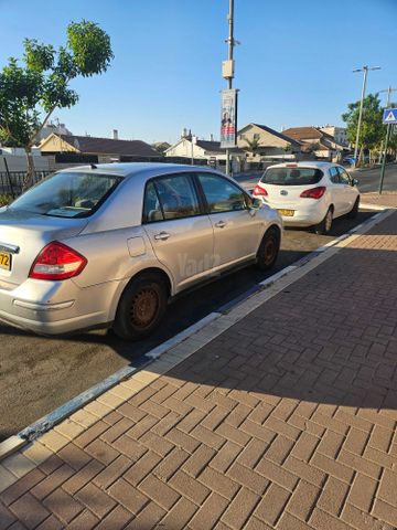 מודעת רכב ניסאן טידה