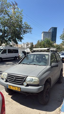 גרנד ויטרה JLX אוט׳ בנזין ג'יפ שטח קשוח 4 מק 3 דל 1.6 (93 כ״ס)
