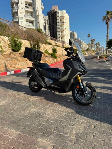 מודעת רכב סאן יאנג ADX400