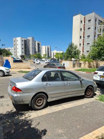 מודעת רכב מיצובישי לנסר