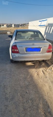 מודעת רכב מאזדה 323