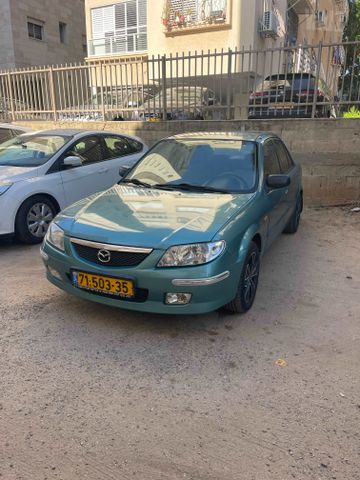 מודעת רכב מאזדה 323