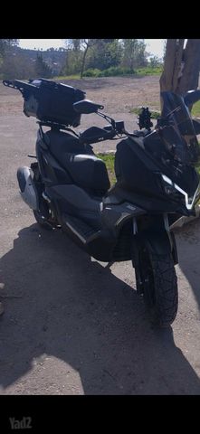 מודעת רכב סאן יאנג ADX 300