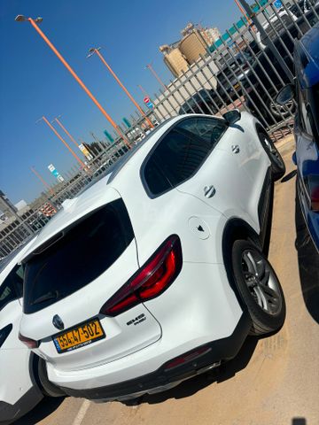 מודעת רכב אם ג'י EHS PHEV