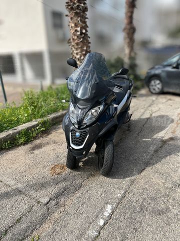 מודעת רכב פיאג'ו MP3 400