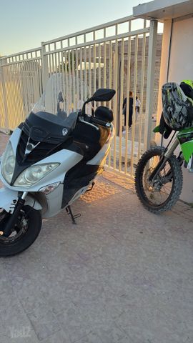 מודעת רכב סאן יאנג ג'וי רייד 200