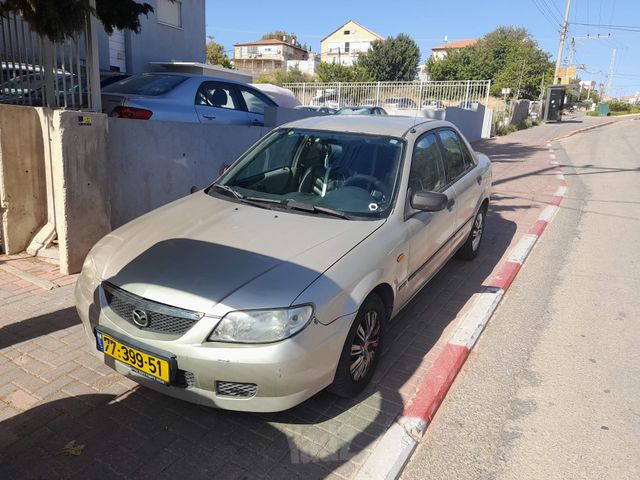 מודעת רכב מאזדה 323