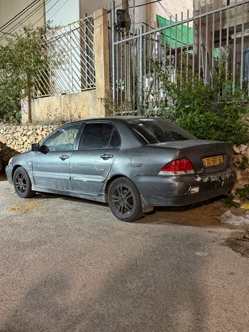 מודעת רכב מיצובישי לנסר