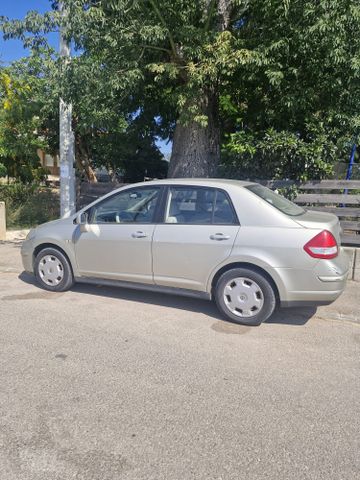 מודעת רכב ניסאן טידה