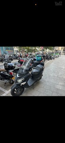 מודעת רכב סאן יאנג ג'וי רייד 200