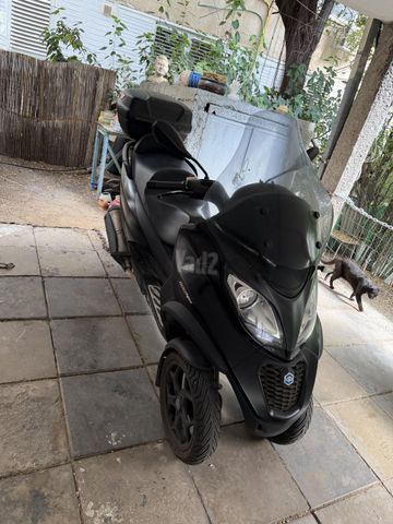 מודעת רכב פיאג'ו MP3 500