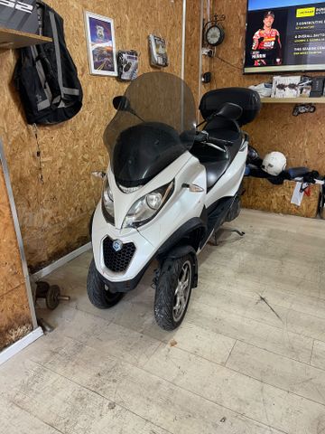 מודעת רכב פיאג'ו MP3 500