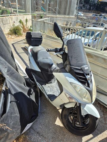 מודעת רכב סאן יאנג ג'וי רייד 125