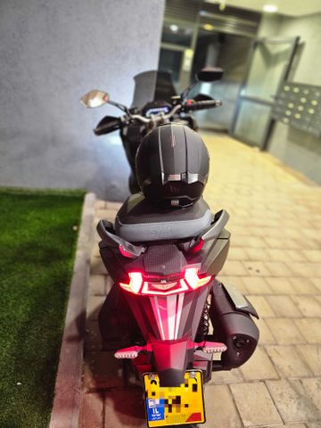 מודעת רכב סאן יאנג ADX 300