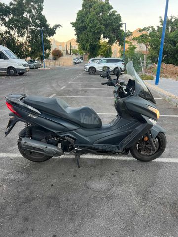 מודעת רכב קימקו איקס-טאון 125I