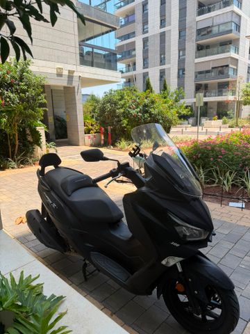מודעת רכב סאן יאנג ג'וי-מקס Z-300