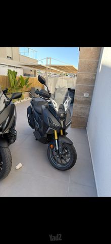 מודעת רכב סאן יאנג ADX400