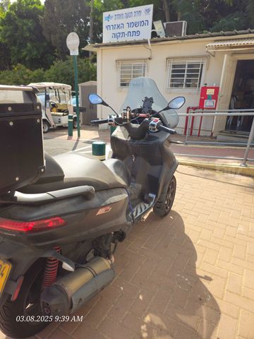 מודעת רכב פיאג'ו MP3 500
