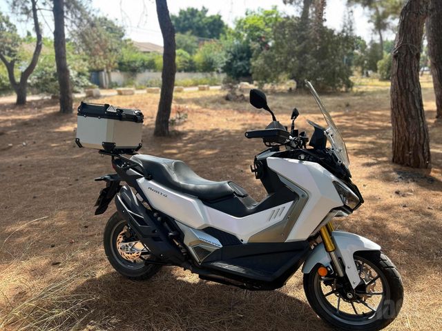 מודעת רכב סאן יאנג ADX400