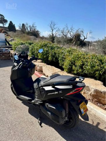 מודעת רכב סאן יאנג ג'וי-מקס Z-300