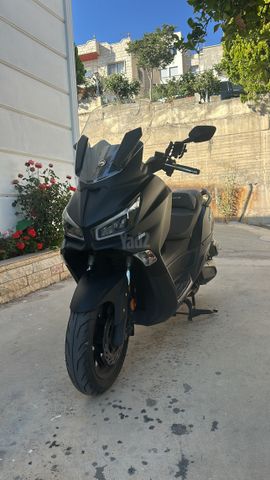 מודעת רכב סאן יאנג ג'וי-מקס Z-300