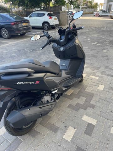 מודעת רכב סאן יאנג ג'וי-מקס Z-300