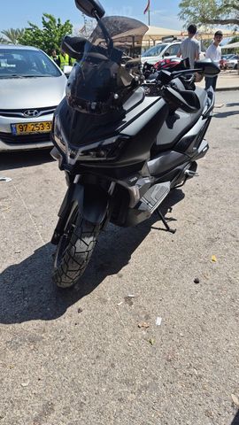 מודעת רכב סאן יאנג ADX 300