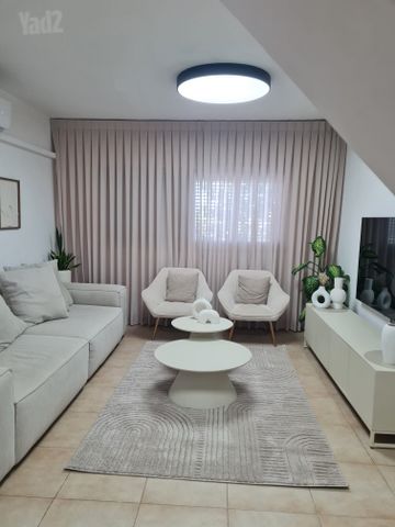 האשל 52