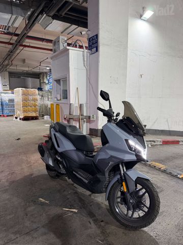 מודעת רכב סאן יאנג ADX 300