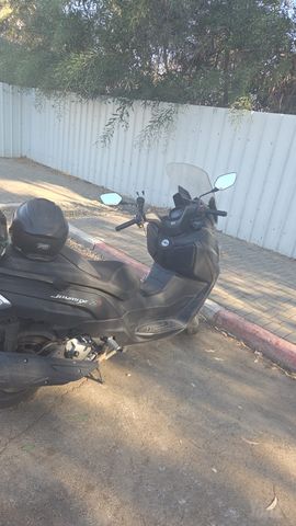 מודעת רכב סאן יאנג ג'וי-מקס Z-250