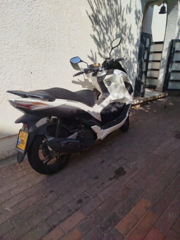 מודעת רכב סאן יאנג ג'ט איקס 125