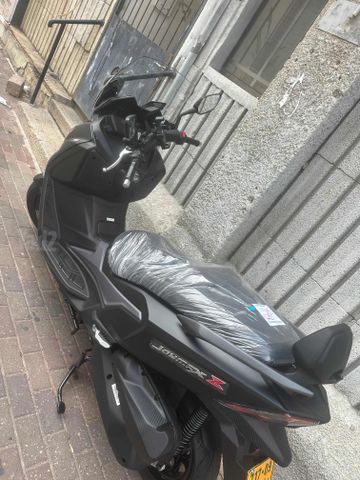 מודעת רכב סאן יאנג ג'וי-מקס Z-300