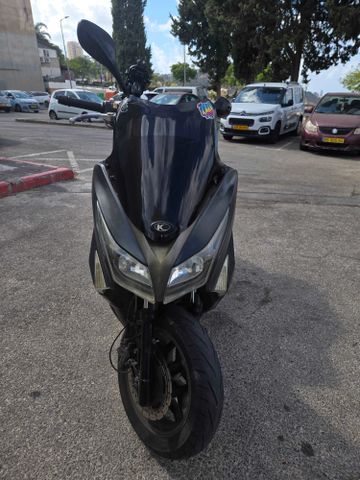מודעת רכב קימקו איקס-טאון 125I