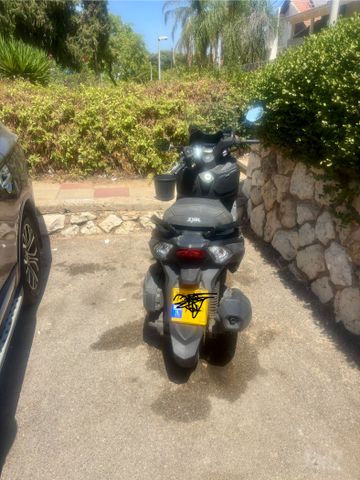 מודעת רכב סאן יאנג ג'וי-מקס Z-300