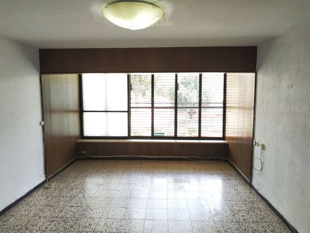 הרצל 52