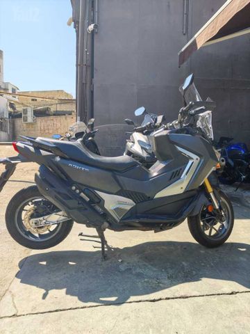 מודעת רכב סאן יאנג ADX400