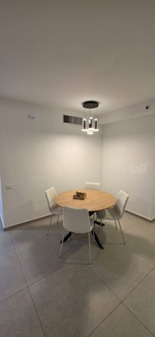 י"א הספורטאים 