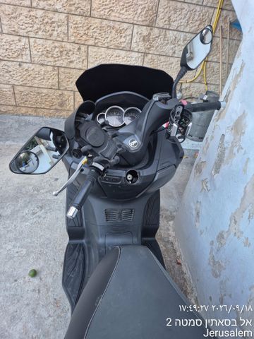 מודעת רכב סאן יאנג ג'וי-מקס 300 XI