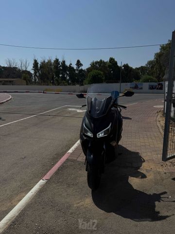מודעת רכב סאן יאנג ג'וי-מקס Z-250