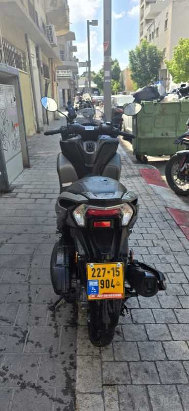 מודעת רכב סאן יאנג ג'וי-מקס Z-300