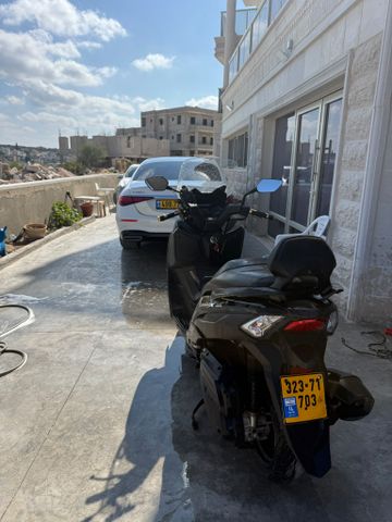 מודעת רכב סאן יאנג ג'וי-מקס Z-300