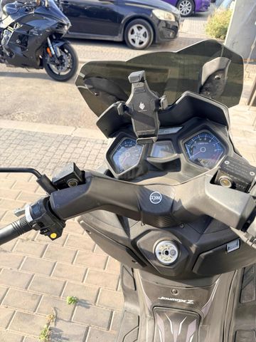 מודעת רכב סאן יאנג ג'וי-מקס Z-300