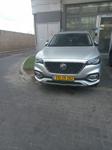 מודעת רכב אם ג'י EHS PHEV