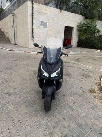 מודעת רכב סאן יאנג ג'וי-מקס 125