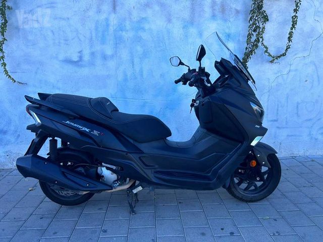 מודעת רכב סאן יאנג ג'וי-מקס Z-300
