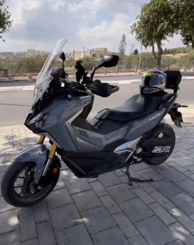 מודעת רכב סאן יאנג ADX400