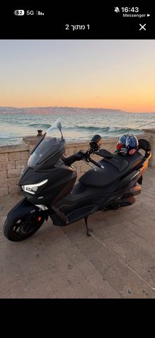 מודעת רכב סאן יאנג ג'וי-מקס Z-300