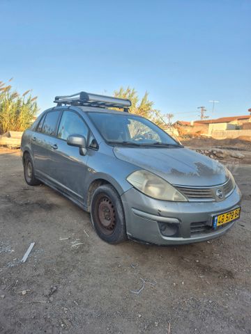 מודעת רכב ניסאן טידה