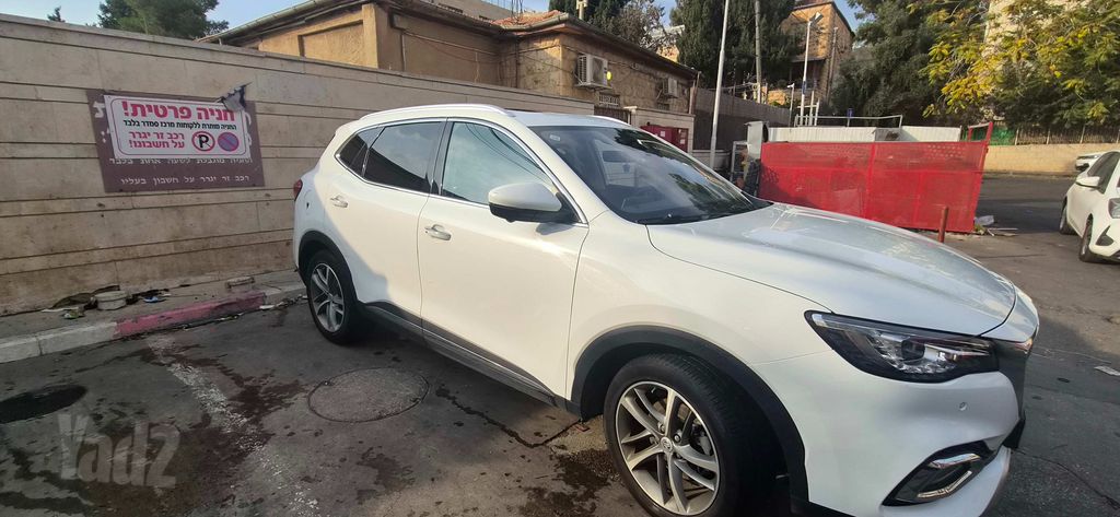 מודעת רכב אם ג'י EHS PHEV