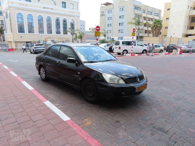 מודעת רכב מיצובישי לנסר